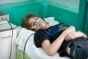 A young man undergoing treatment at Gomel Children's Hospital